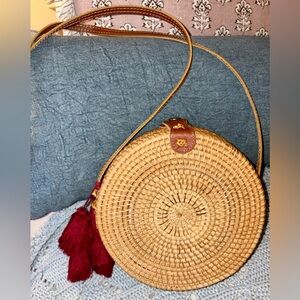 Round wicker bag Bag with Red Tassel floral detail